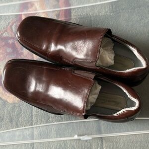 Kenneth Cole leather slip on shoes.